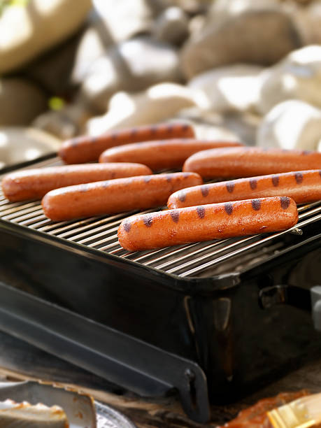 istock Hotdogs on an Outdoor Grill 184345326