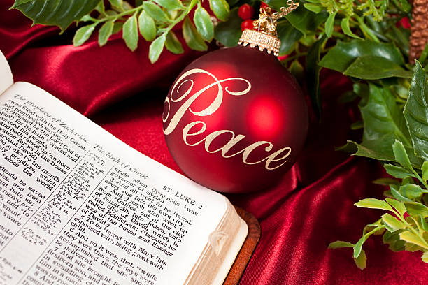 istock Peace Red Christmas ornaments with open Bible 184345359