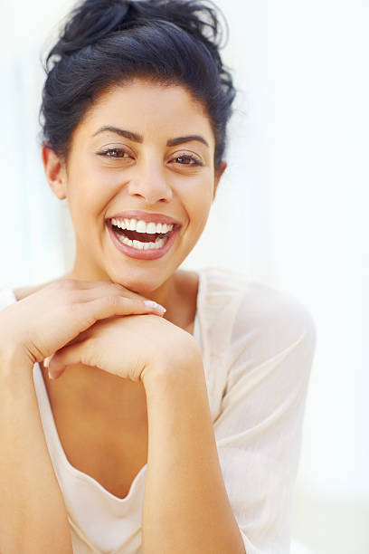 istock Young woman laughing 184345970