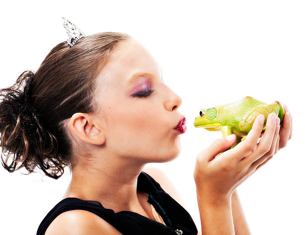 istock Little Princess Kissing Frog Prince 184346414