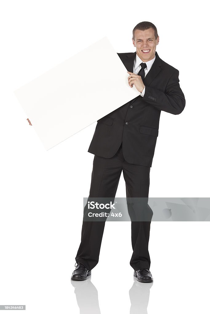 Empresário segurando um quadro - Royalty-free Fato Foto de stock