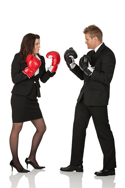 istock Business excutives fighting in boxing gloves 184346518