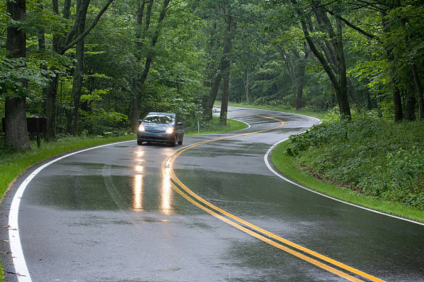 Car driving on Skyline Drive, Shenandoah National Forest, Virginia "Skyline Drive, Blue Ridge Mountains, Shenandoah National Forest, Virginia" skyline drive virginia photos stock pictures, royalty-free photos & images
