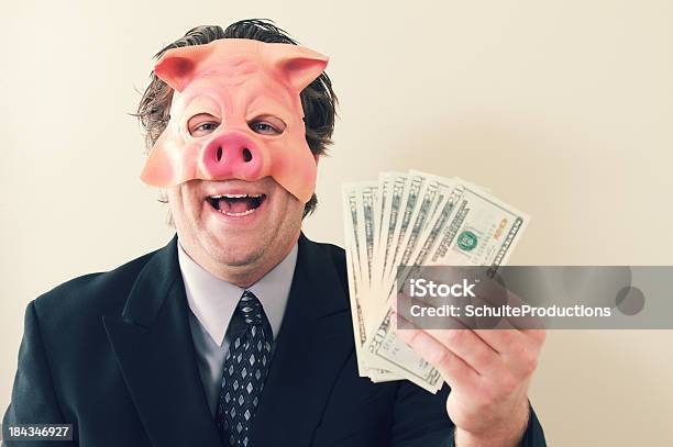 Cerdo Hombre De Negocios Con Dinero Foto de stock y más banco de imágenes de Agarrar - Agarrar, Codicia, Adulto