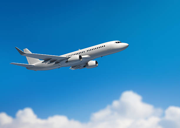 White mid-sized passenger jet airplane stock photo