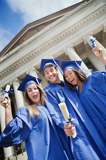 istock Happy Excited Highschool students Celebrating Graduation Vt 184347692