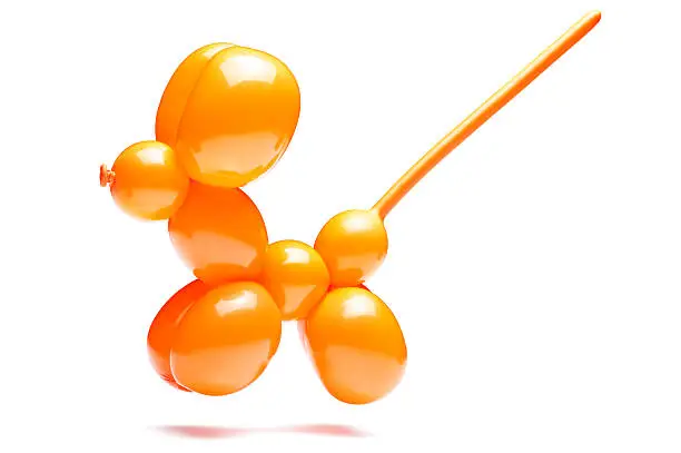 photographed floating toy balloon with natural soft shadows. clipping path included.