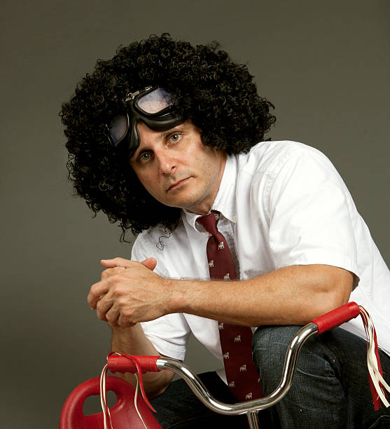istock Dude wearing afro with tricycle 184348674