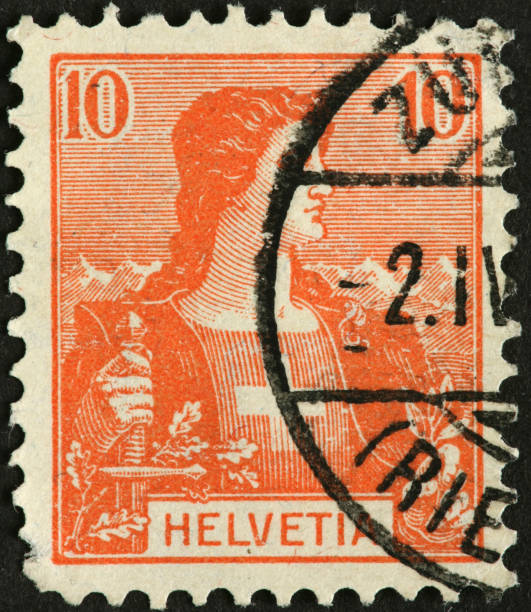 istock woman with sword on a very old Swiss postage stamp 184349718