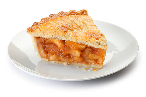 Slice of apple pie on a plate isolalted on a white background A slice of apple pie on a plate.  Clipping path included.Please see some similar pictures from my portfolio: apple pie photos stock pictures, royalty-free photos & images