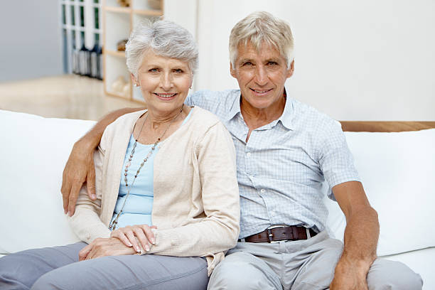 istock Senior couple on couch 184350224