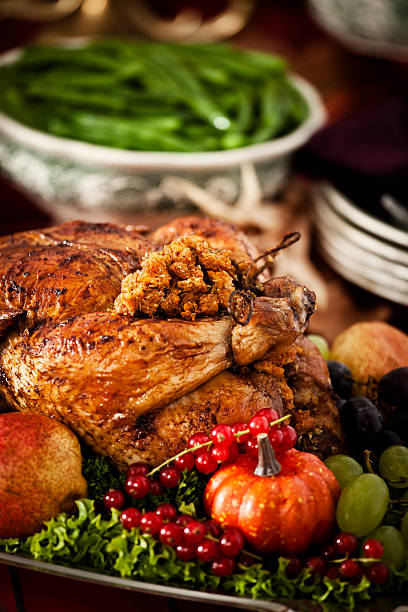 istock Thanksgiving Dinner with Stuffed Turkey and Side Dishes 184350253