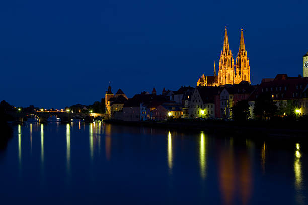 Regensburg, Germany Cityscape of Old Town Regensburg with reflection in the Danube River. The Regensburg Cathedral is a prime example of Gothic architecture in southern Germany. danube river stock pictures, royalty-free photos & images