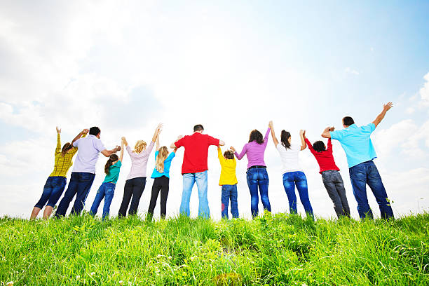 istock Rear view of a large group in nature. 184350552