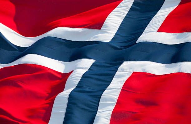 Flag of Norway The norwegian flag on a windy day. norwegian flag stock pictures, royalty-free photos & images