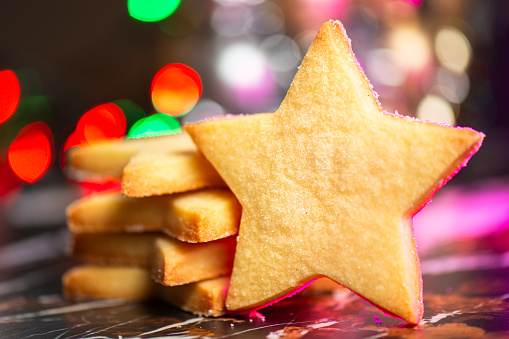 Melt in your mouth Christmas Shortbread Cookies shaped as a star and dusted with castor sugar.
