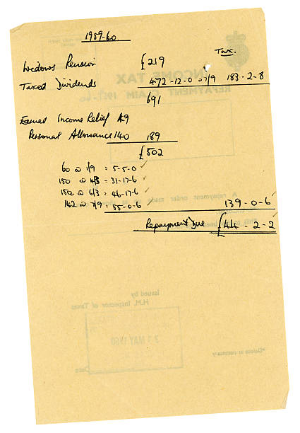 istock Handwritten income tax calculations, 1960 184352087
