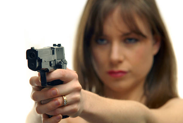 Girl with Gun stock photo