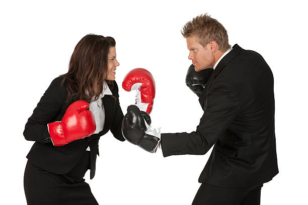 istock Business executives fighting in boxing gloves 184352291