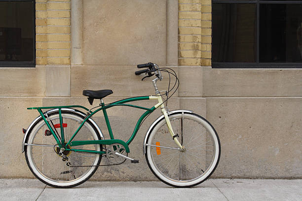 istock Vintage Bicycle Leaning Against Brick, Concrete Wall with Windows 184353059