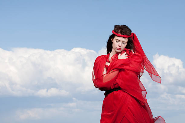 istock Woman in Red Outdoors 184353193