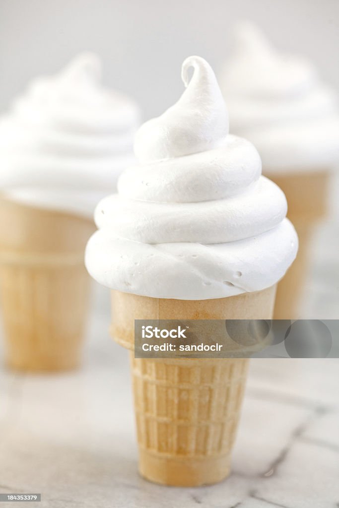 Soft serve vanilla ice cream cones Three soft cream vanilla ice cream cones. Soft Serve Ice Cream Stock Photo