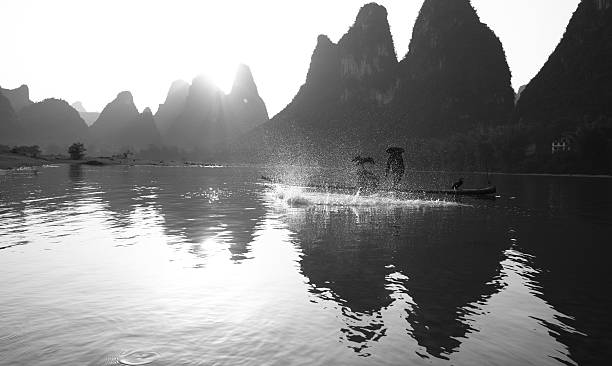istock Fisherman fishing on Li River 184353913