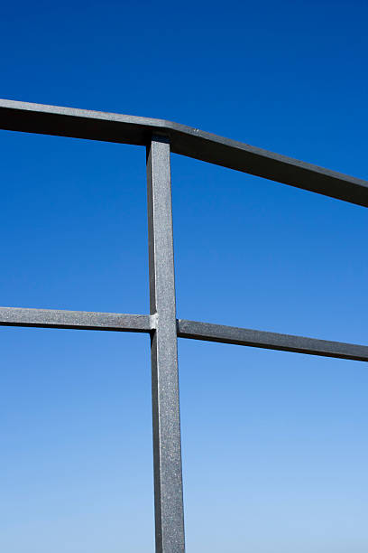 istock gray bannister with blue sky 184355093