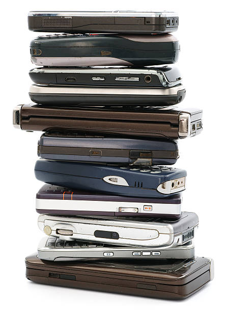 istock Stack of old mobile phones isolated on white background 184355536