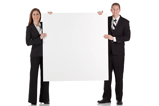 istock Business executives holding a placard 184355650
