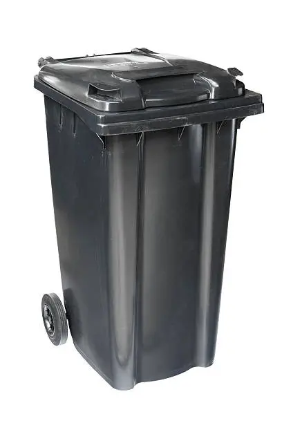 Standard wheeled plastic garbage bin; isolated on white.