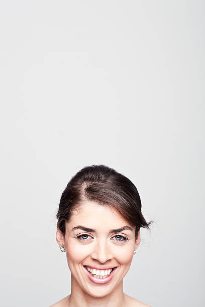 istock Young woman smiling with copy space. 184356057