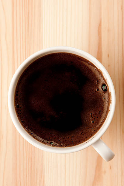 istock Coffee mug on the wooden desk 184356620