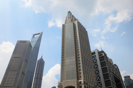 Shanghai financial district in Lujiazui with the Shanghai Stock Exchange and Shanghai World Financial Centre.