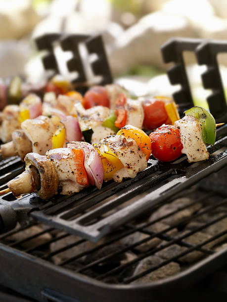 istock Chicken and Vegetable Kabobs on a Outdoor BBQ 184356830