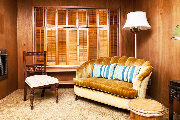 Retro Reading Room "Photo of a reading room furnished with out-of-date furniture, carpet and fixtures." shag rug stock pictures, royalty-free photos & images