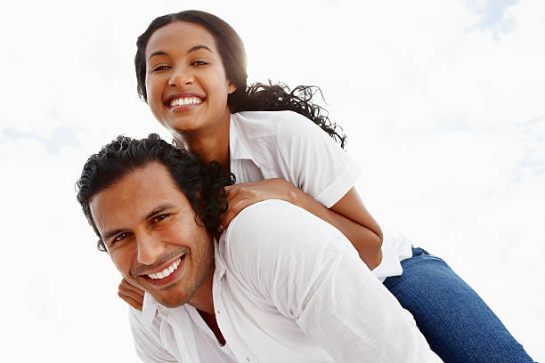 istock Couple enjoying piggyback ride 184357221