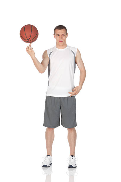istock Athlete holding a basketball on his finger 184357238