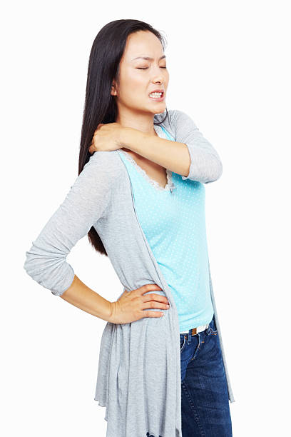 istock Woman with a terrible neck pain 184357532