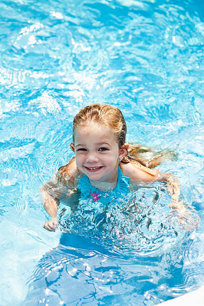 istock Little girl in swimming pool 184357748