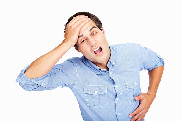 istock Young man with head and stomach ache 184357962
