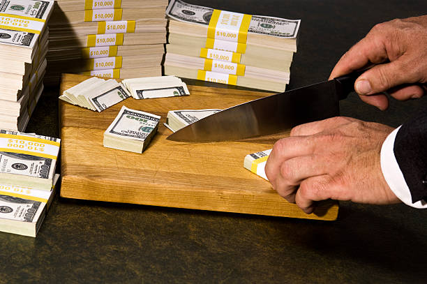 istock Budget cutting literally during the recession. 184358016