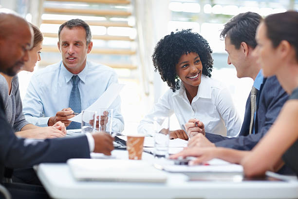 istock Confident business people in office meeting 184358109