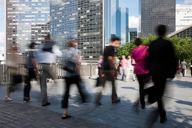 istock Business Commuters Walking in Front of Office Buildings 184359415