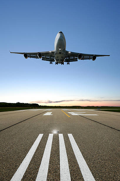 istock XL jumbo jet airplane landing 184359705