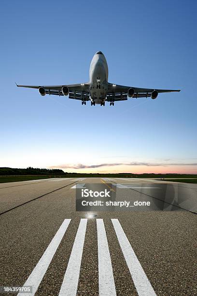 Xl Jumbo Jet Airplane Landing Stock Photo - Download Image Now - Above, Aerospace Industry, Air Vehicle