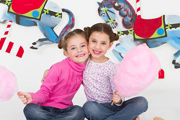 istock Happy friends having fun at amusement park - studio shot 184359865