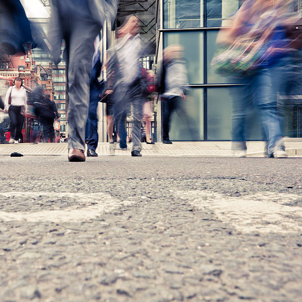 istock Commuters Crossing the Road in London 184359974