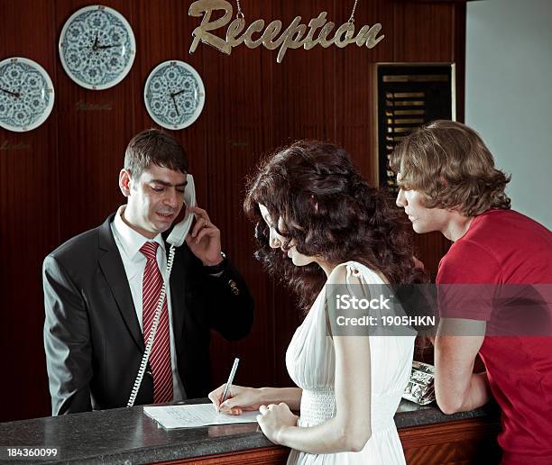 Hotel Receptition Stock Photo - Download Image Now - Hotel Reception, Talking, Using Phone