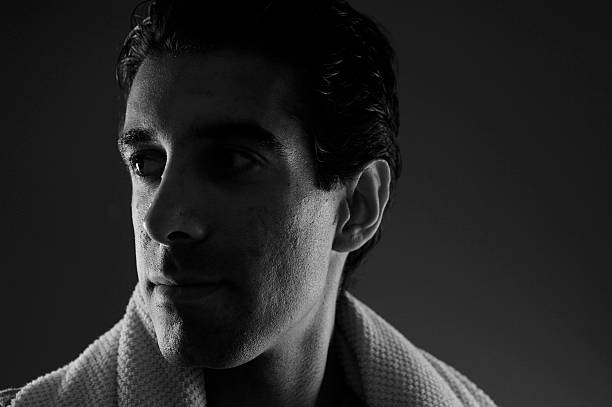 istock Pensive Man with Towel on Shoulders 184360441